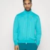 Nike Performance Heritage - Training Jacket - Teal -Clothing Promotion Shop 98149e1d031246e0bfd9ed0f145741c9